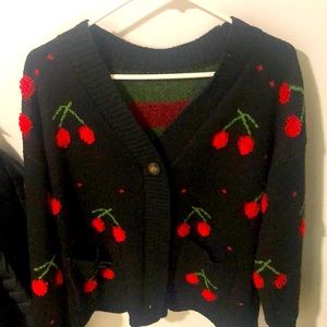 I’m selling a cherry cardigan